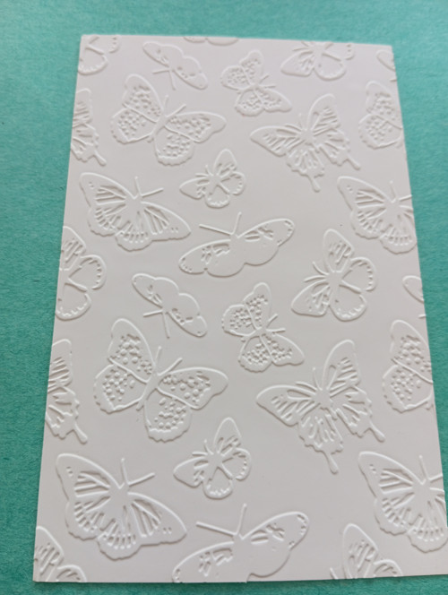Embossing motyli