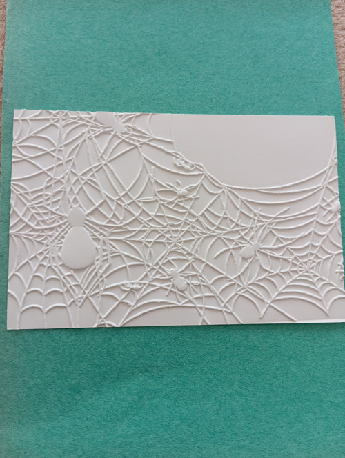 Embossing pavučina