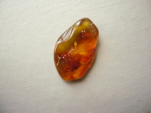 Troml. kámen – jantar extra 24 mm, č.119f