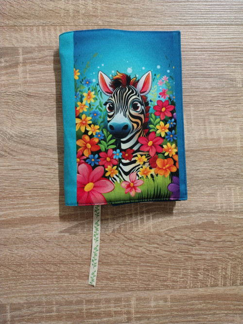 Rostoucí obal na knihu zebra