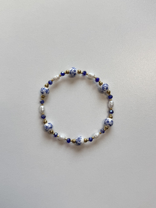 Gold and blue bracelet with pearls