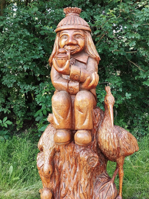 Dřevěný vodník s volavkou a kachnami
