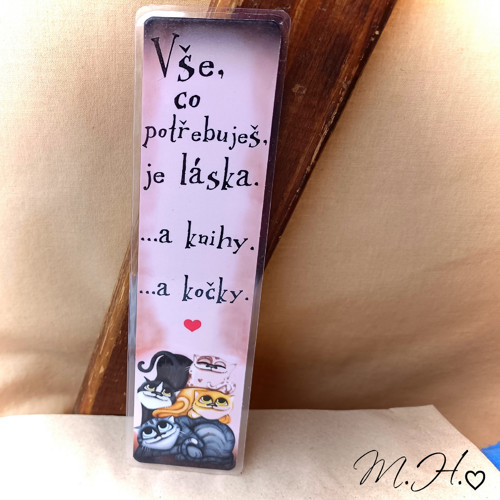 Vše, co potřebuješ, je láska. A knihy. A kočky.