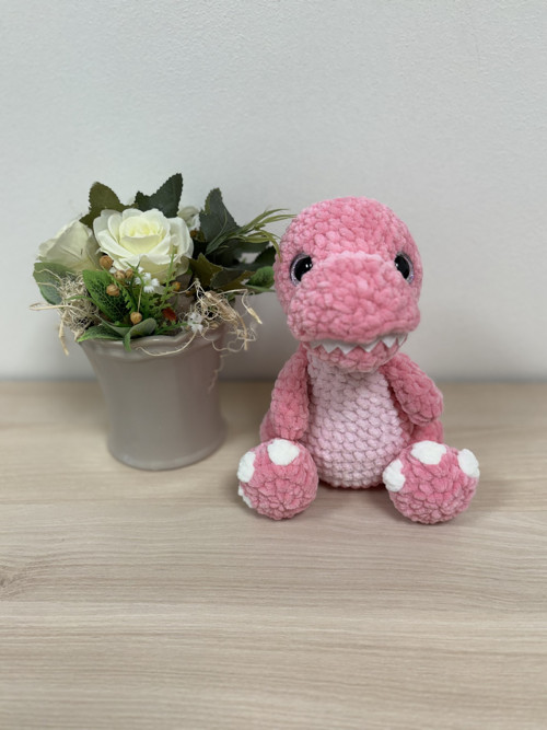 Háčkovaný dinosaurus