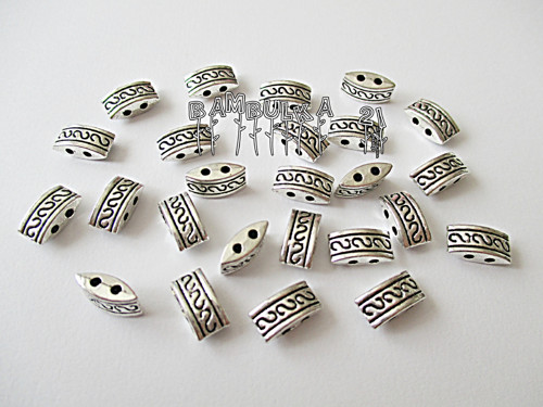 Kovový masivní oválek-dvoudírkový, mezičlán 10x5mm