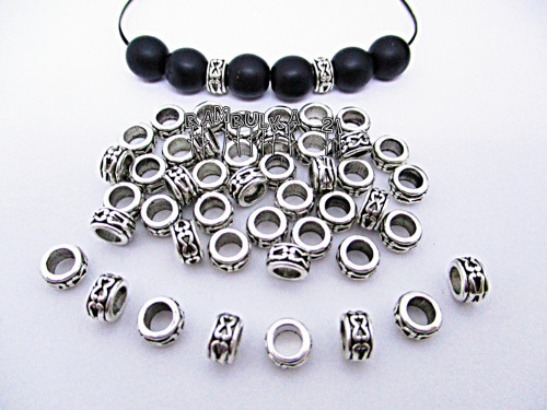 Kovový mezičlánek s větším průtahem cca 7x3,5mm