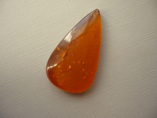 Kabošon - jantar 33 mm, č.12f
