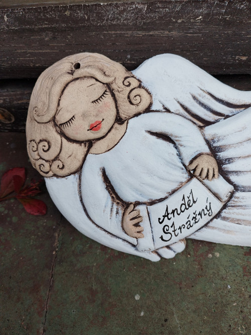 Andílek letící , reliéf — foto 1