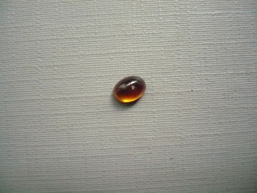 Kabošon - granát hessonit 6 mm, č.114Bf — foto 1