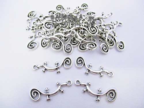 Kovový přívěsek ještěrka, 25x8mm, starostříbro