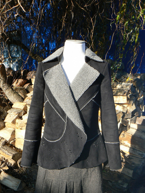 Elegantní hřejivý kožíšek, vel. cca 38.