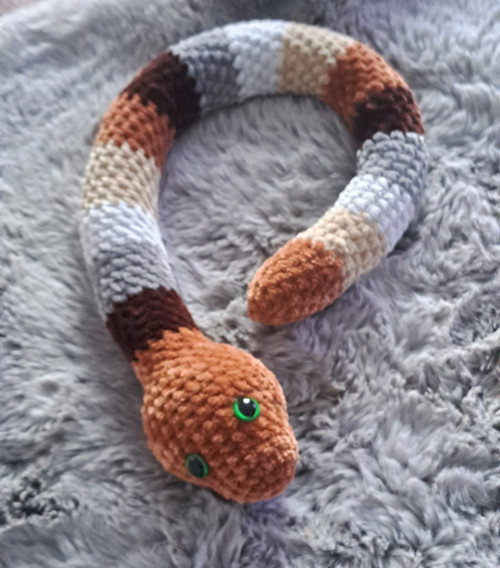Háčkovaný had