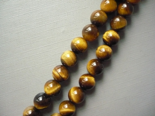 Vrtané kuličky 8,5 mm - tygří oko, 1 ks