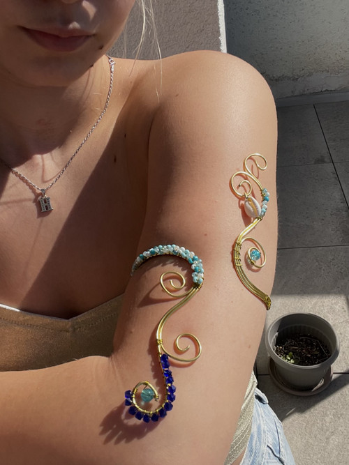 Arm cuff s mušlí