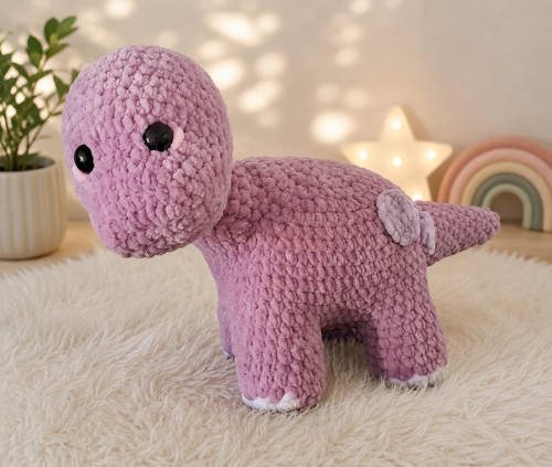 Háčkovaný dinosaurus
