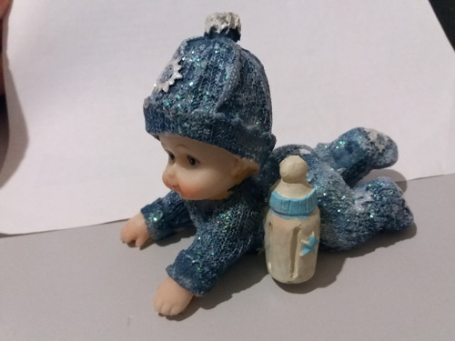 Figurka „Dítě s lahvičkou“