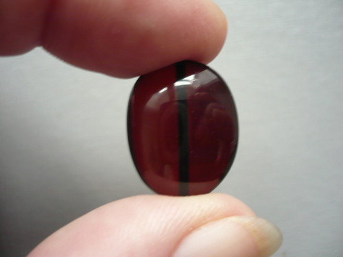 Vrt. medailonek - jantar AA 22 mm, č.22f