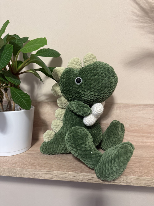 Háčkovaný dinosaurus