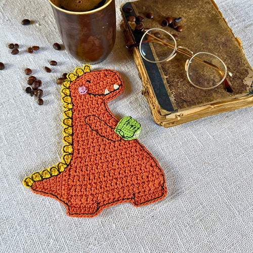 Háčkovaný podtácek – dinosaurus Arthur s knihou