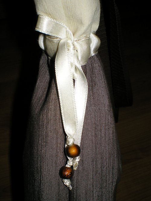 Hnědo- béžová s kolečky — foto 2