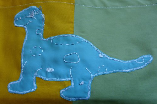 Kapsář s dinosaurem — foto 3