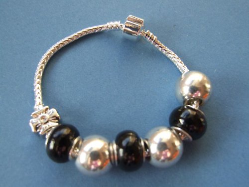 Velmi elegantní, černý, pandorácký — foto 2