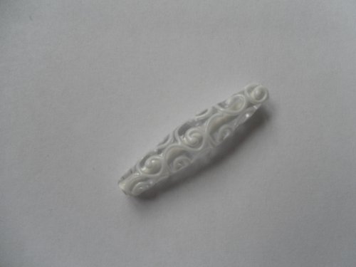 Špulka s ornamenty — foto 2