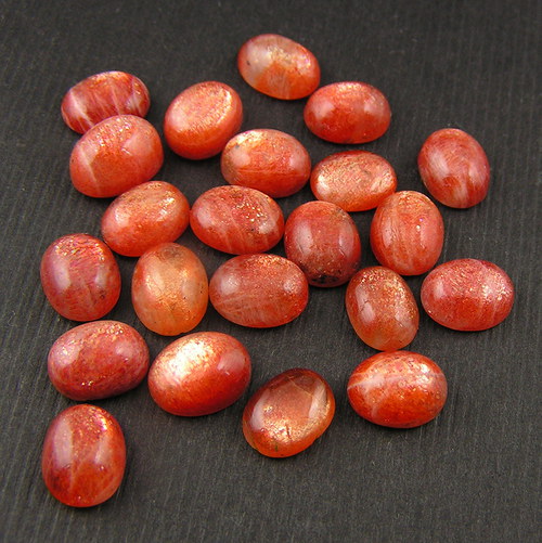 Sluneční kámen - kabošon — foto 2