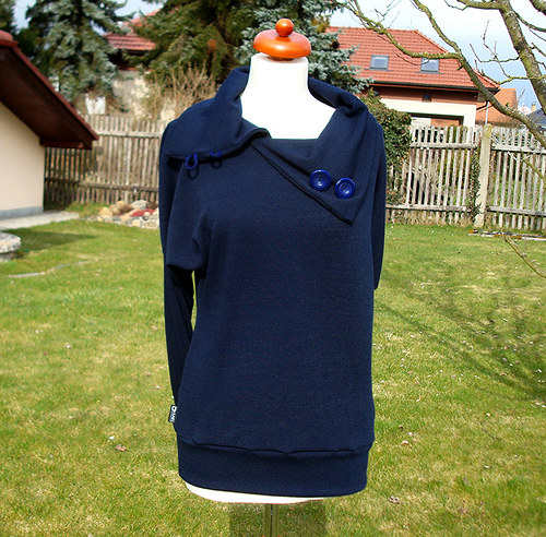 Svetřík s velkým límcem — foto 3