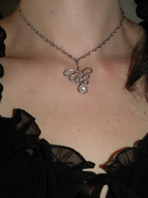 Ornament s perlou — foto 3