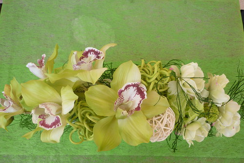 Orchidej v bílé váze — foto 2