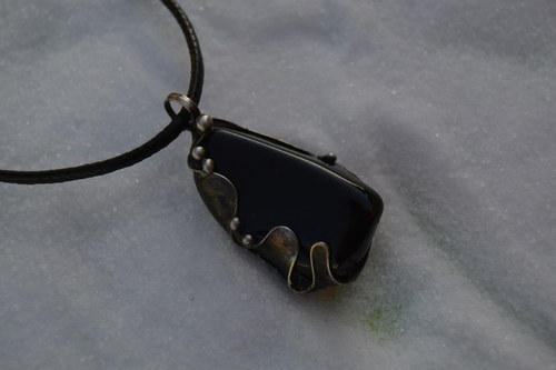Černý amulet plný síly — foto 2
