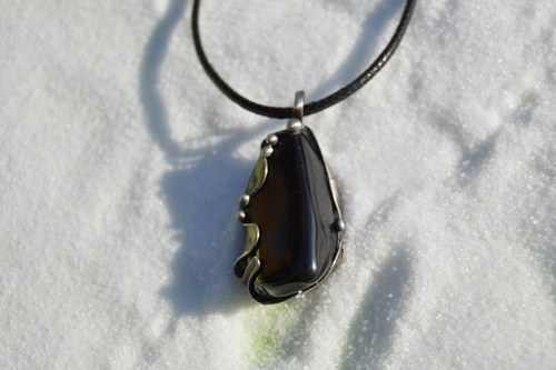 Černý amulet plný síly — foto 5