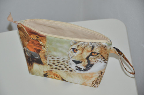 Necesér – gepard a zebry — foto 4