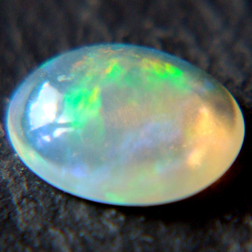 Ethiopský Welo opál - kabošon 0,35ct — foto 2