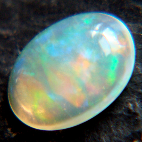 Ethiopský Welo opál - kabošon 0,35ct — foto 4
