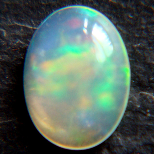 Ethiopský Welo opál - kabošon 0,35ct — foto 5