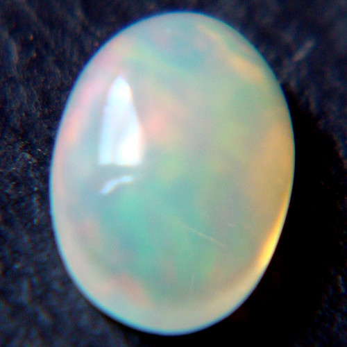 Ethiopský Welo opál - kabošon 0,65ct — foto 3