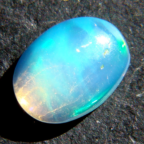 Ethiopský Welo opál - kabošon 0,55ct — foto 2