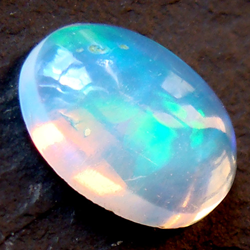 Ethiopský Welo opál - kabošon 0,55ct — foto 5