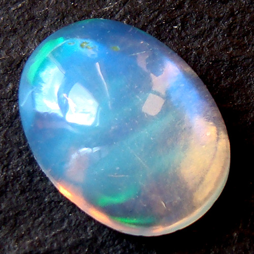 Ethiopský Welo opál - kabošon 0,55ct — foto 6