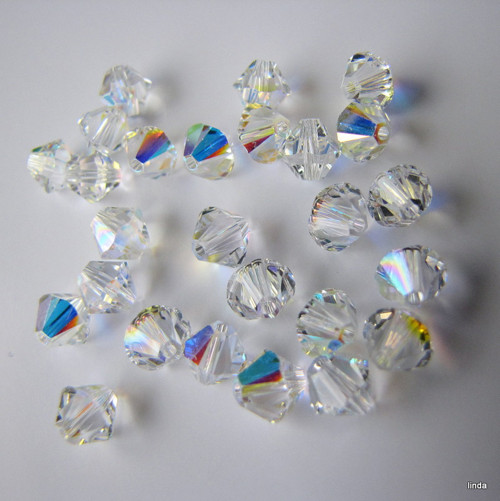SWAROVSKI * ELEMENTS * sluníčko 6mm * 2ks / bal — foto 2