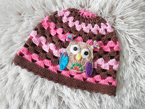 Růžovohnědá dírkovka se sovičkou — foto 4
