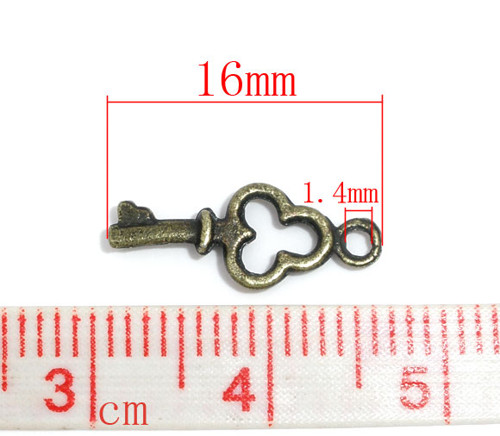 MINI klíč/ bronz/ 16x6mm — foto 2