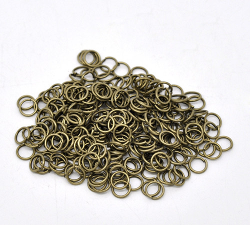 Kroužky/ ant.bronz/ 7mm, tl. 0,9mm — foto 2