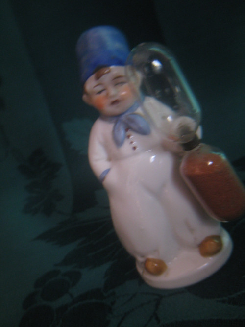 Porcelánová figurka-přesýpací hodiny — foto 4