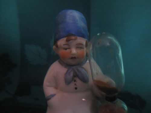 Porcelánová figurka-přesýpací hodiny — foto 6