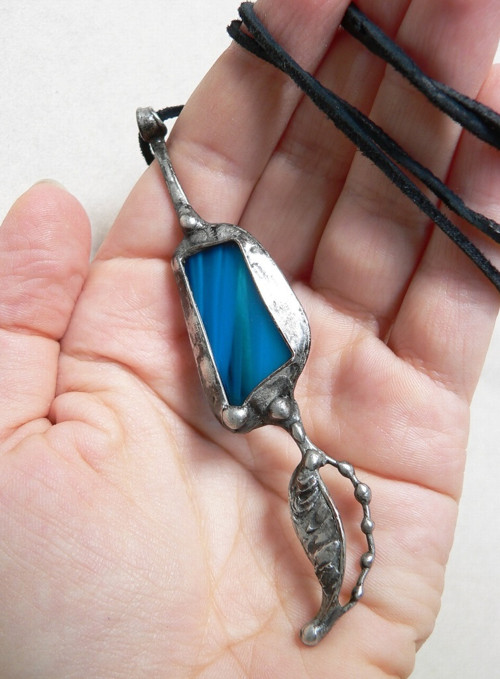 Modrý amulet — foto 2