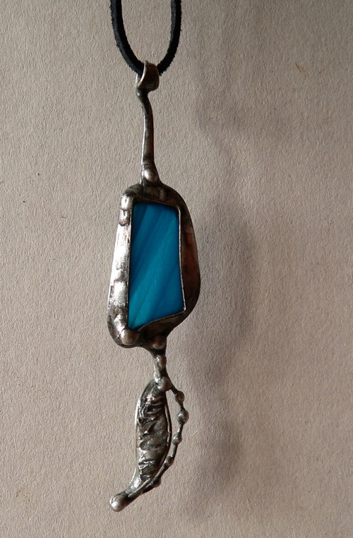 Modrý amulet — foto 3