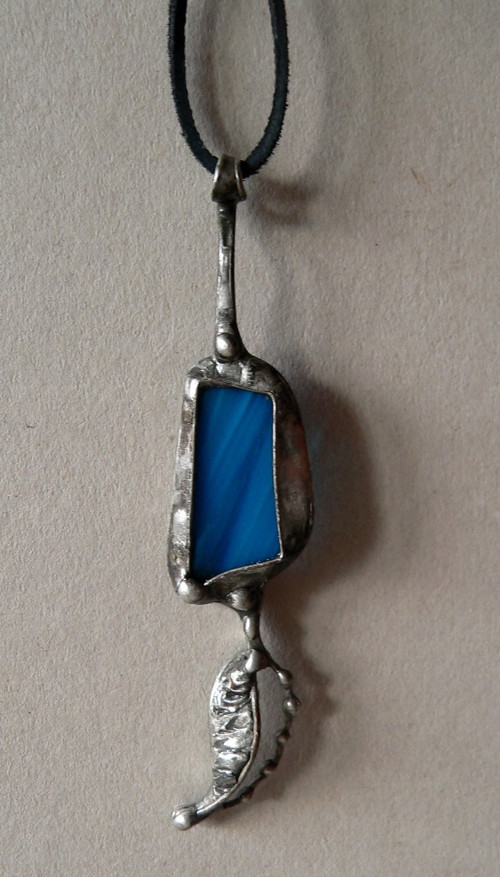 Modrý amulet — foto 4